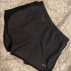 Girls dark gray Nike tempo shorts